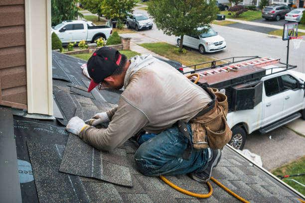 Professional Roofing technician working in Angola, NY